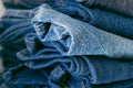 Stack of stonewash denim jeans