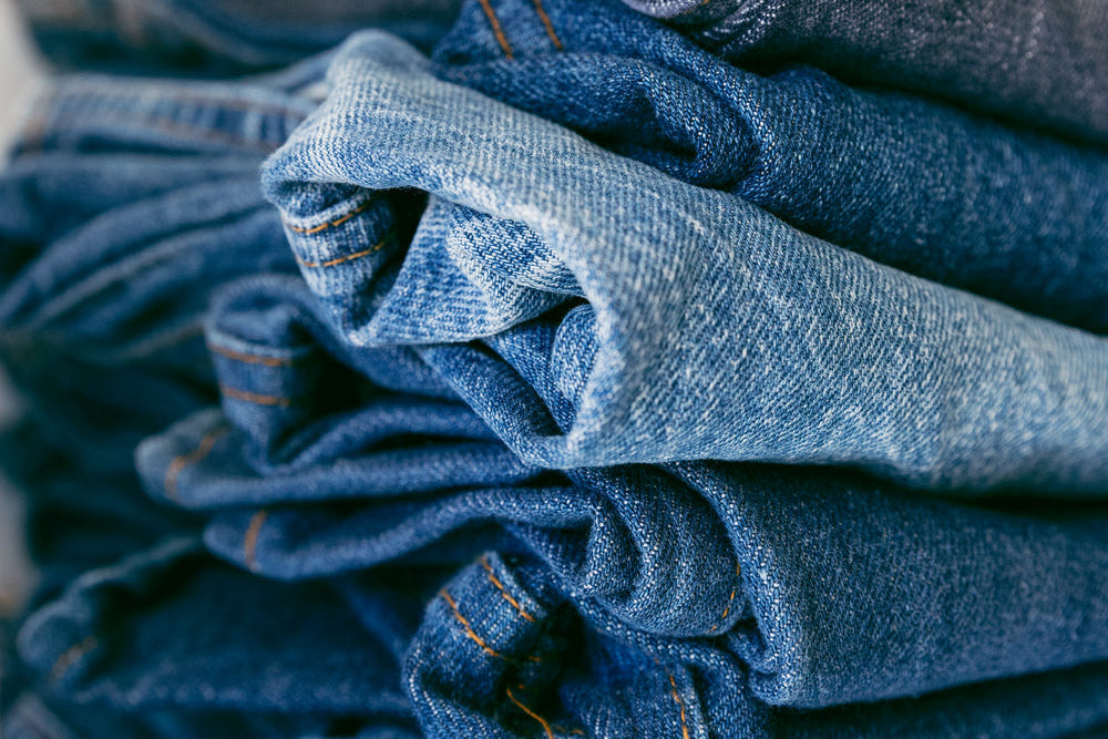 Stack of stonewash denim jeans